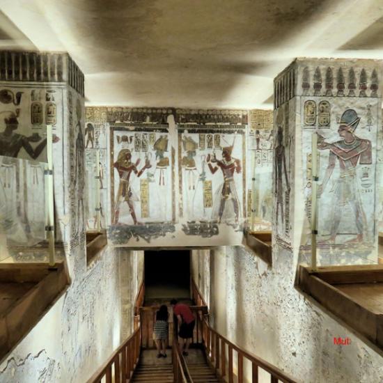 An elderly man standing inside the Valley of the Kings, Luxor