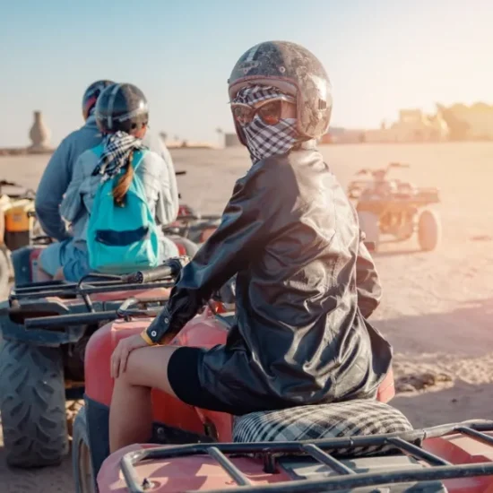 Girl riding a beach buggy during Hurghada safari