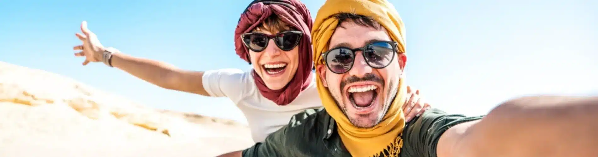 Couple riding beach buggy Sharm desert, a part of our 12 Days Cairo, Nile Cruise & Sharm El Sheikh Family Tour