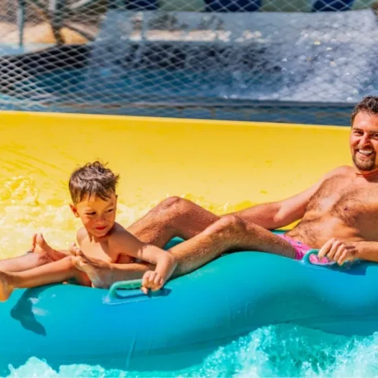 Father and son enjoying a swimming pool in Hurghada as a part of our 7 Days Cairo, Luxor and Hurghada Family Tour
