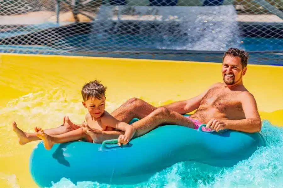 Father and son enjoying a swimming pool in Hurghada as a part of our 7 Days Cairo, Luxor and Hurghada Family Tour