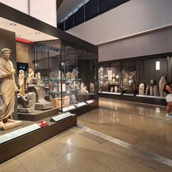 Grand Egyptian Museum interior with artifacts