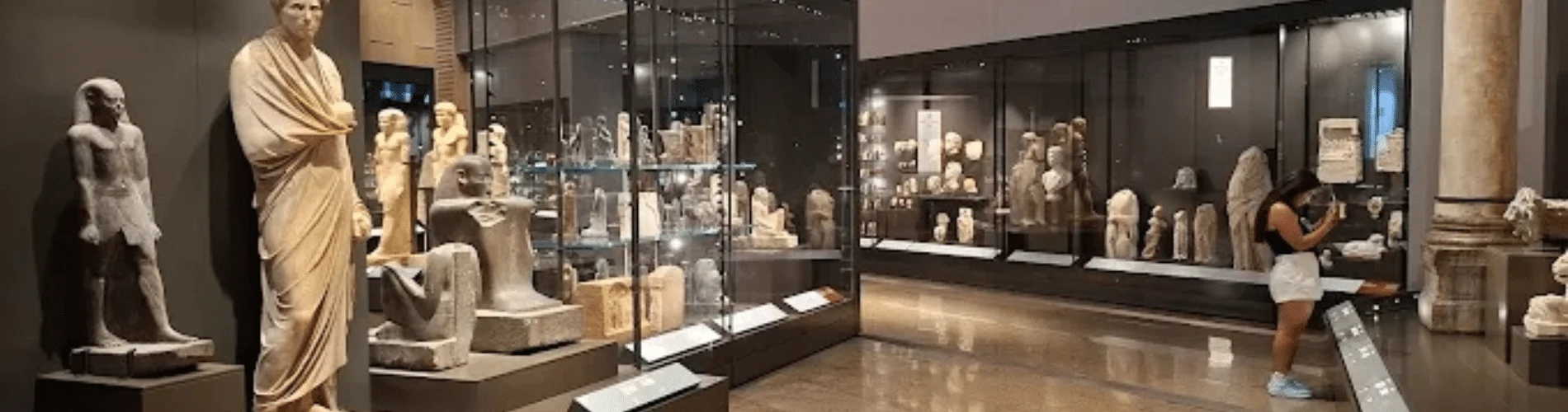 Grand Egyptian Museum interior with artifacts as a part of out 8 Days Cairo, Nile Cruise & Alexandria Family Vacation