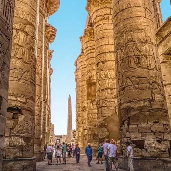 Tourists visiting Karnak Temple by day