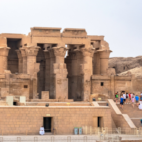 Visitors exploring Kom Ombo Temple by day