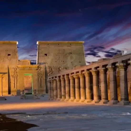 Philae Temple illuminated at night on the Nile
