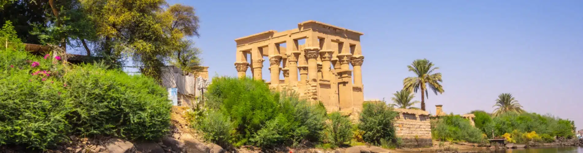 Philae Temple surrounded by the Nile as a part of our 15 Days Cairo, Sharm El Sheikh, Nile Cruise & Alexandria Family Tour