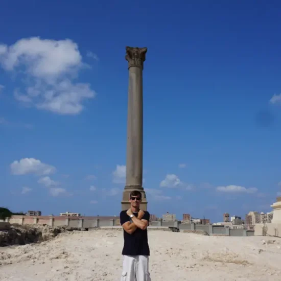 Tourist taking photo at Pompey’s Pillar