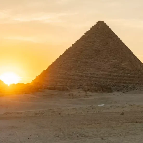 Sunset beside the Great Pyramid of Khufu in Giza