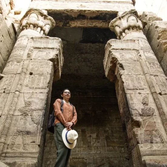 Tourist exploring the Temple of Edfu