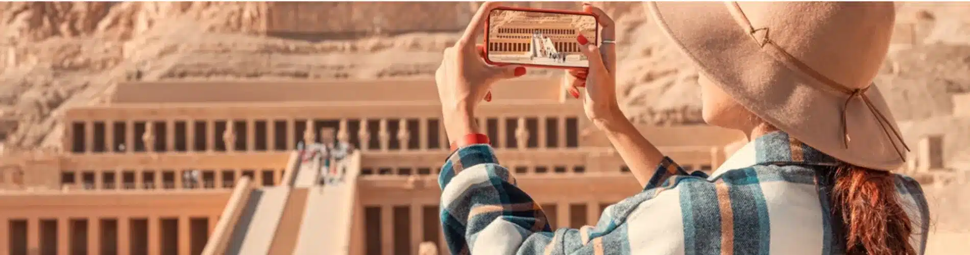 Tourist taking photos of Hatshepsut Temple