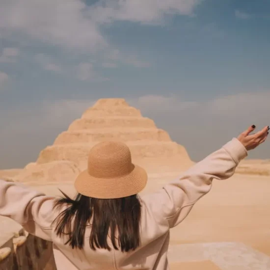 Tourist in front of the Saqqara Step Pyramid