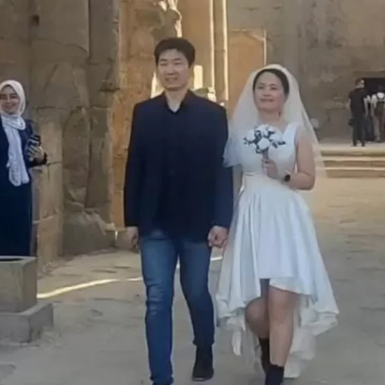 A couple celebrating their wedding at Karnak Temple