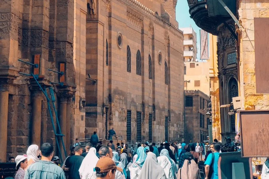 People walking in Al Muizz Street in Cairo a partt of our 6 Days Egypt Tour Package