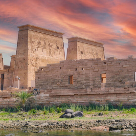 Philae Temple surrounded by the Nile River, a part of our 6 Days Cairo, Luxor, Aswan and Abu Simbel Budget Tour