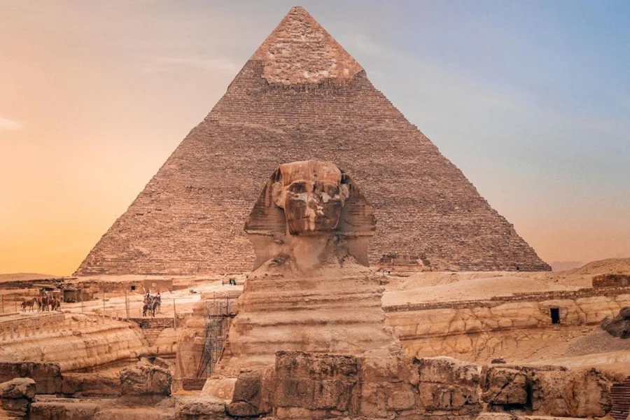 The Sphinx with the Great Pyramid in Giza during our 6 Days Cairo, Luxor & Aswan Budget Holiday