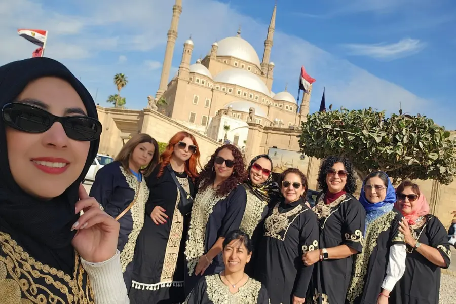 Tourists enjoying a cultural experience in Egypt, reflecting how simple Arabic words can help create warmer local connections