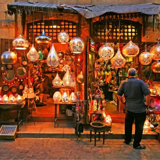 Tourist standing at a lantern shop in Khan El Khalili