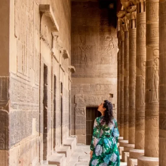 Tourist standing in front of Philae Temple