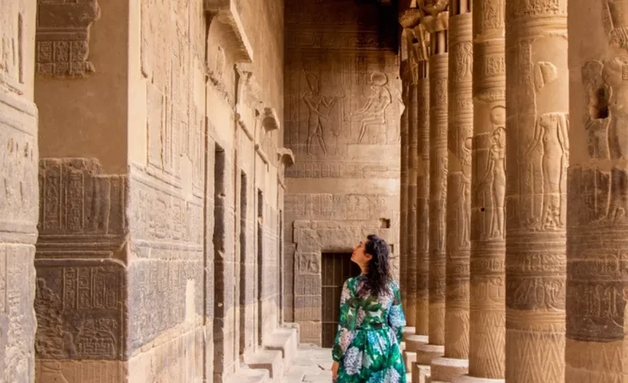 Tourist standing in front of Philae Temple