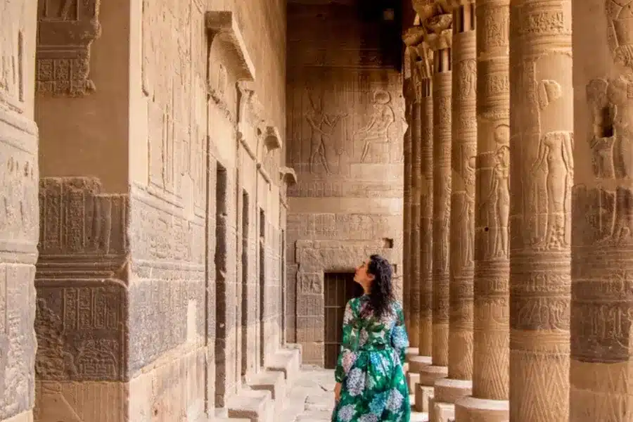 Tourist standing in front of Philae Temple