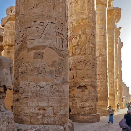 Tourists exploring Karnak Temple in Luxor during our 6 Days Cairo, Luxor & Aswan Budget Holiday