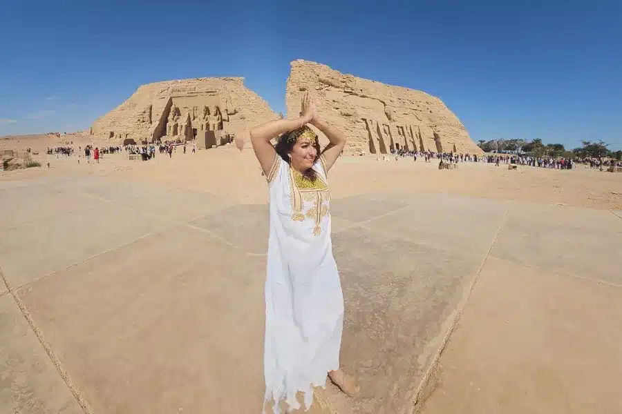 Solo traveller standing in front of Abu Simbel Temple in southern Egypt