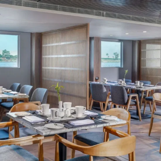 Historia Nile Cruise restaurant with elegant dining setup and Nile views