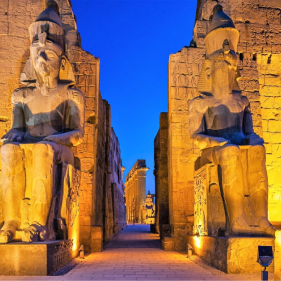 Luxor Temple entrance illuminated at night