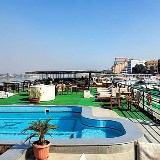 Swimming pool and sun loungers on MS Zeina Nile Cruise