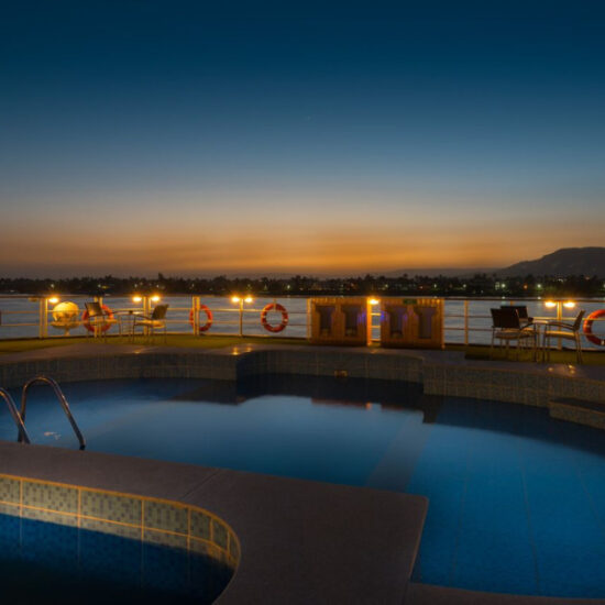 Swimming pool on the cruise deck at night