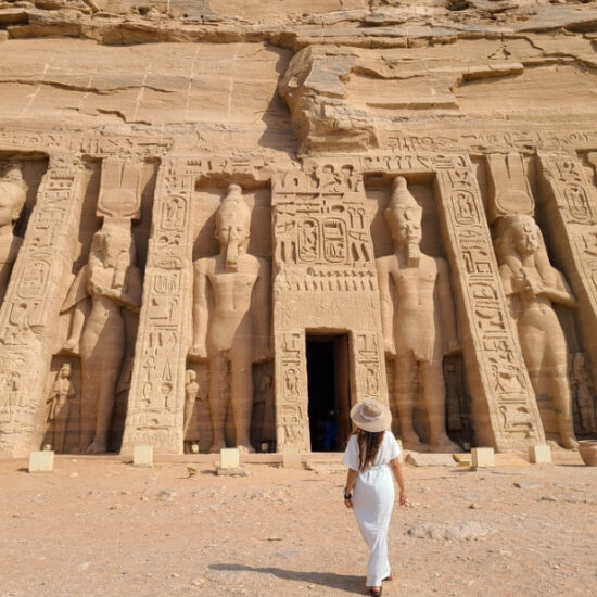 Tourist standing in front of Abu Simbel Temple