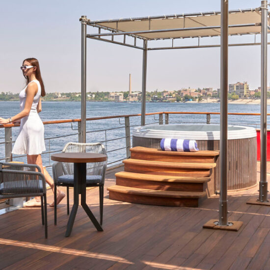 Tourist looking at the Nile from the cruise deck