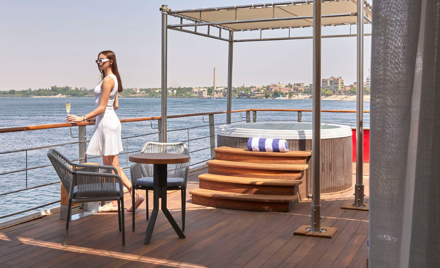 Tourist looking at the Nile from the cruise deck